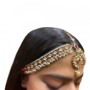 Ruby, freshwater pearls and Kundan headgear