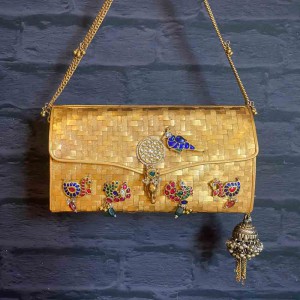 Woven Gold Clutch With Traditional Motifs